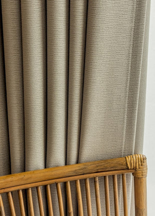 a close up of a bamboo bed frame