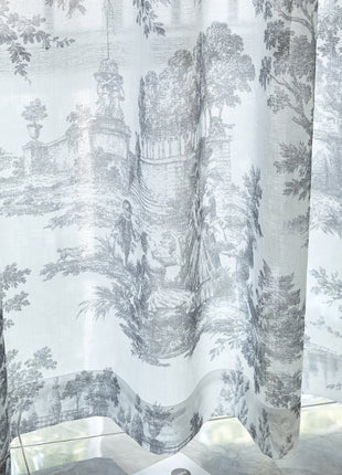 a curtain with a picture of a castle on it