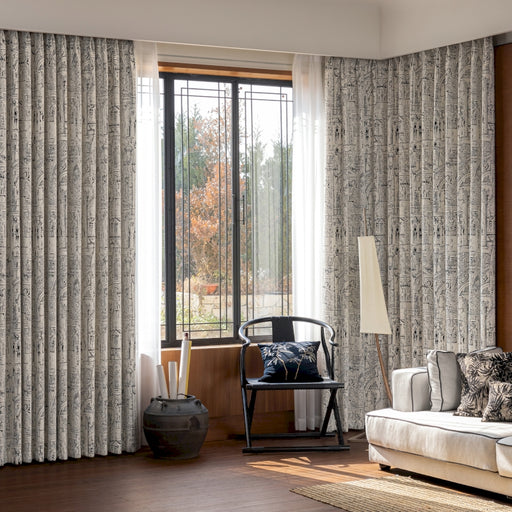 a living room filled with furniture and a large window