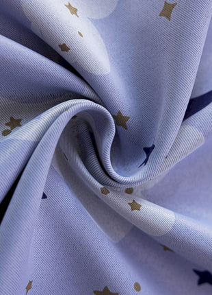 a blue fabric with gold stars on it