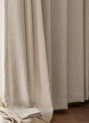 a book sitting on top of a wooden floor next to a window