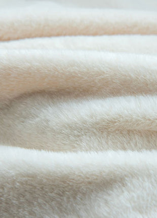 a close up of a blanket with a white background
