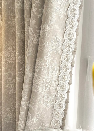 a white chair sitting next to a window