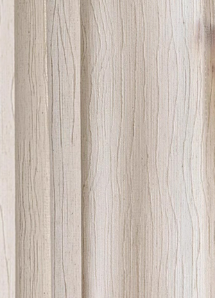 A hand is holding a white curtain with vertical lines, partially covering a window.