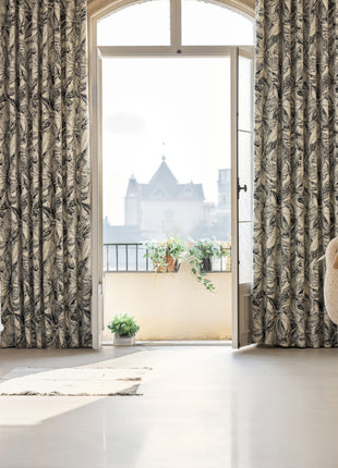 a sheep is standing in front of a window