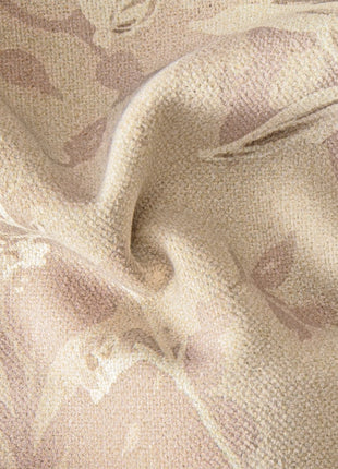 a close up of a fabric with a flower pattern