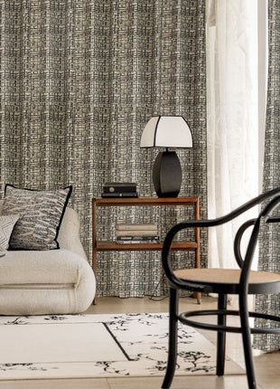 a living room with a couch, chair and table