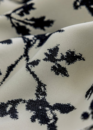 a close up of a black and white fabric