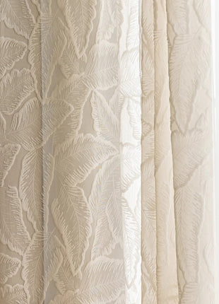a close up of a curtain with a white background