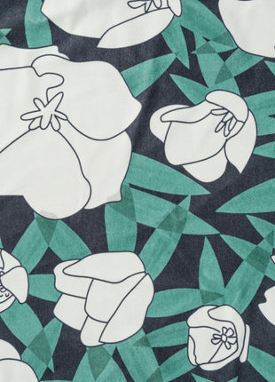 a close up of a pattern of flowers on a black background