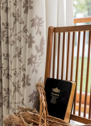 a wooden chair with a book on top of it