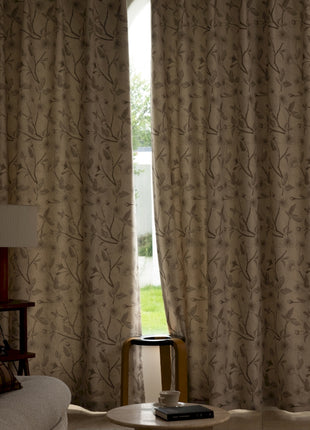 a living room filled with furniture and a window
