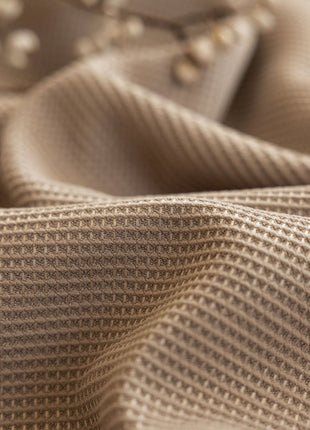 a close up of a fabric with a pattern