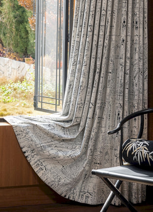 a chair sitting in front of a window