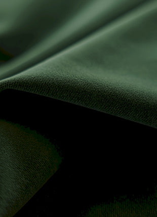 a close up view of a green fabric