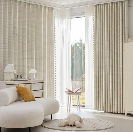 a living room with a white couch and a white rug