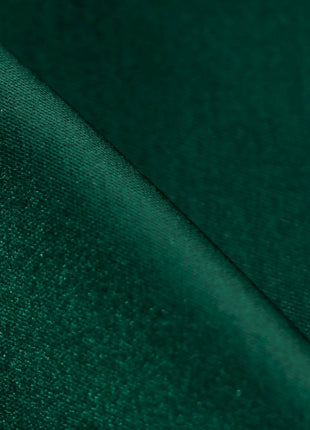 a close up view of a green fabric