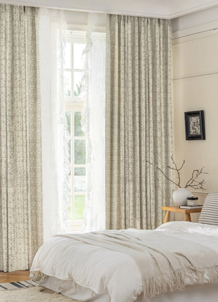 a bedroom with a bed and a chair