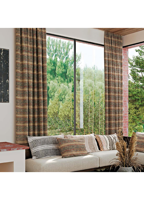 a living room filled with furniture and a large window
