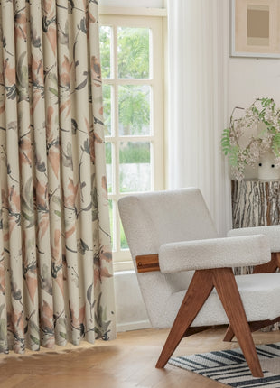 a white chair sitting in front of a window