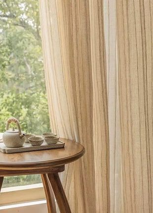 a small table with a cup of coffee on top of it