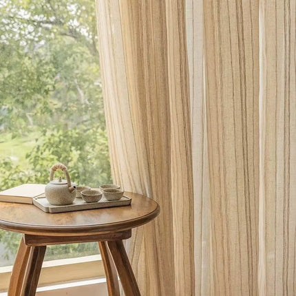 a small table with a cup of coffee on top of it