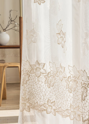 a bathroom with a shower curtain and a mirror