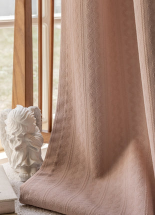 a book sitting on top of a table next to a window