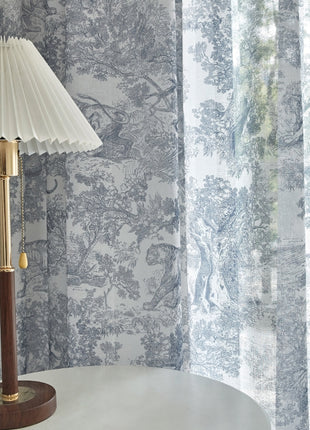 a lamp sitting on top of a table next to a window