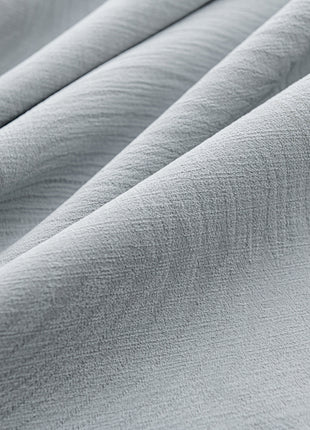 a close up view of a white fabric