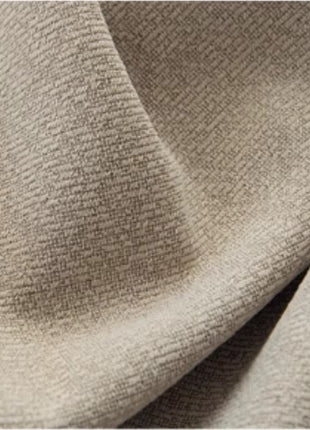 a close up view of a beige fabric