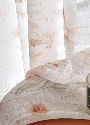 a candle sitting on top of a table next to a window