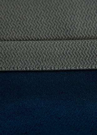 a close up of a blue and grey fabric