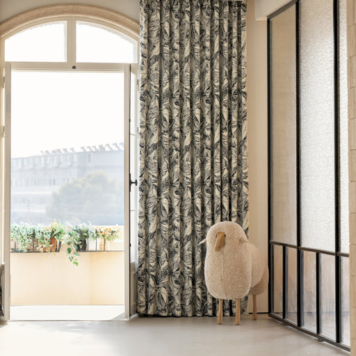 a sheep is standing in front of a door