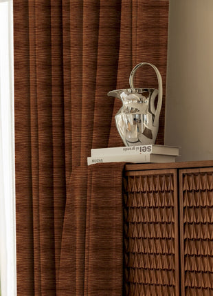 a vase sitting on top of a shelf next to a window