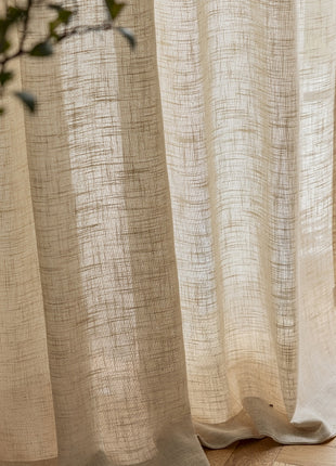 a close up of a curtain on a window