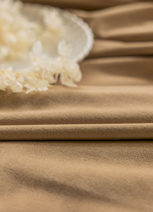 a paper plate with white flowers on it