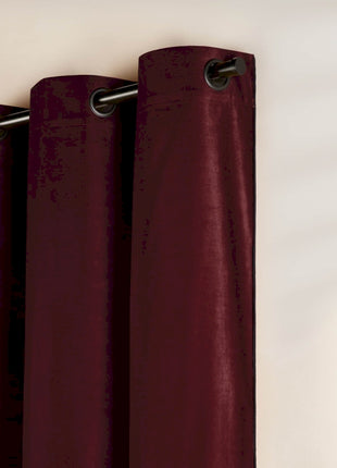 a close up of a curtain with a metal rod