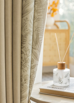 a table with a book and a candle on it