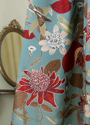 a bathroom with a mirror and a curtain