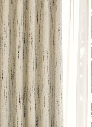 a window with a white curtain and a tree outside of it