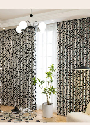 a living room filled with furniture and a plant