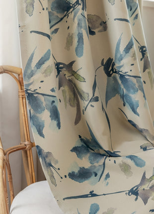 a chair with a blue and green floral print on it