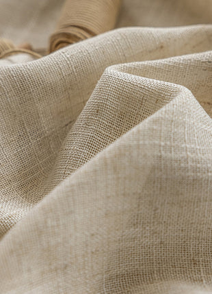 a close up view of a beige fabric
