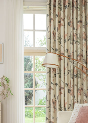 a living room with a couch and a lamp