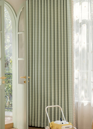 a suitcase sitting in front of a green door