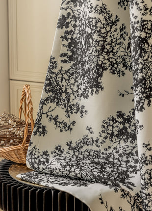 a close up of a curtain on a window sill