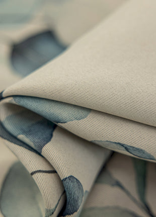 a close up of a fabric with a flower pattern