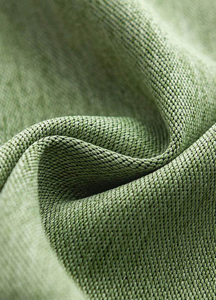 a close up view of a green fabric