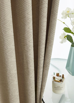 a glass table with a vase of flowers on it